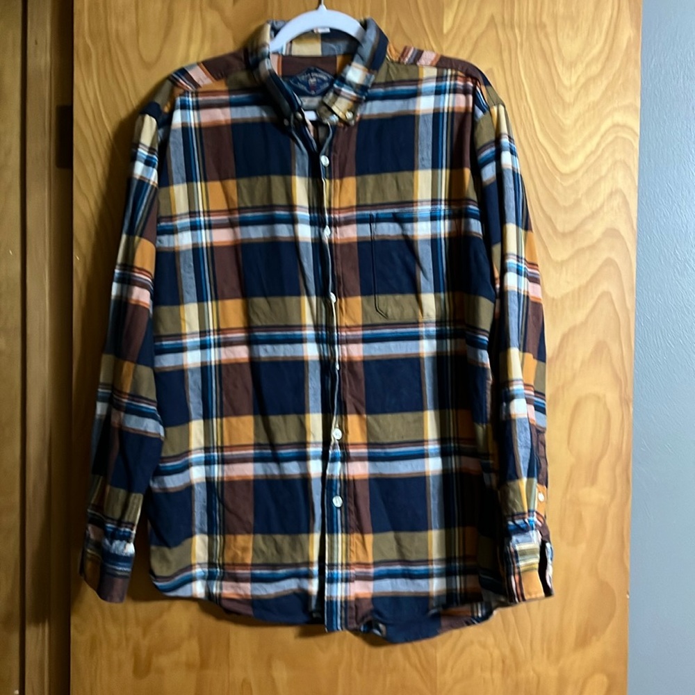 Button Down. Size large.  Very Dressy.   Tan brown and navy colors